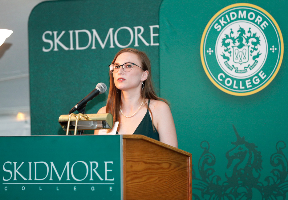 Georgia Dittemore '22, a chemistry major who graduated with honors in May, accepts the 2022 Anne T. Palamountain Scholar Award, presented each year to a Skidmore student or recent graduate who has demonstrated leadership, service to others, and a commitment to the larger good of society.