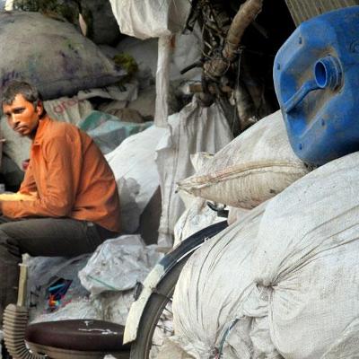 Depicting "People Who Help Other People," fifth-grader "Baby" focused on a man working in one of the many fabric tents that line the street behind Project Why's Okhla Center.