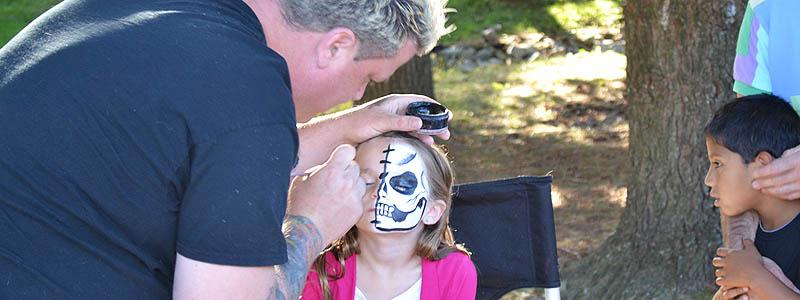 Facepainting at the Greenberg 25th Anniversary picnic