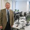 Michael Cohen, architect with Boston-based Elkus Manfredi Architects, designed the renovation. He's pictured here in one of two new electronic classrooms that have been added to the library. 
