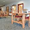 Most tables are now equipped with electrical outlets for students' laptop computers.