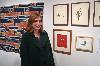 Yvette Cortes w/ prints by Marcel Dzama, Ana Ventura, and Julianna Swaney.