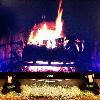 Warming up by the TV fire 