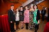 Student performers and speakers mingle before the program.