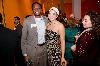Melvis Langyintuo '12, class president, hugs student performer Carolyn Bottelier '13 .