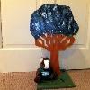 Skids sits under a wodden tree. Is it real? Is he real? What is real, anyhow?