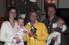 "L" is for "LEGACY!" said Skids as he posed for a family photo with Susan Flanders Davidson '71, niece Kelley Baker Geller '96, daughter Kimberly Davidson Young '04, and potential members of the class of 2034, grand-daughter Julia Susan Young and great-niece Emerson Skye Geller.