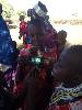 Skids with children of Maasi warrior in Tanzania.