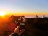 Skids enjoys the sunset from 13,796 feet--above some of the world's highest astronomical observatories on Mauna Kea Volcano on the Big Island of Hawaii. Despite island temperatures by the beach, he should have packed a parka for the 29 degree weather...