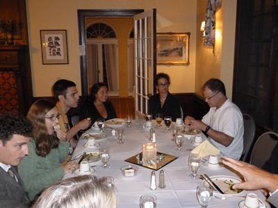 Students%20and%20professors%20enjoy%20a%20post-lecture%20feast%20in%20Skidmore%27s%20Surrey%20Inn.