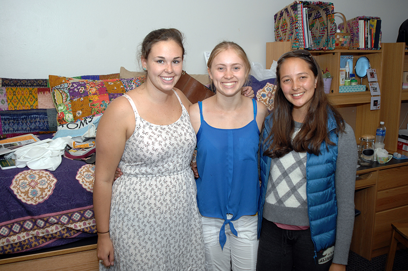 New%20roommates%20Phoebe%20Radcliffe%2C%20Amanda%20Muir%20and%20Karli%20Rasmussen%20take%20a%20break%20from%20getting%20their%20room%20organized.