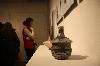 Lauren Reilly's piece 'Jarring Smoke,' raku-fired stoneware, in foreground.