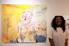 Tuere Lawton with her painting titled 'A Creamsicle Melts into the Ocean'