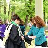 Graduating seniors pick up their diplomas prior to the ceremony.