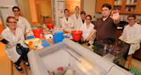 Sheppard and students in lab
