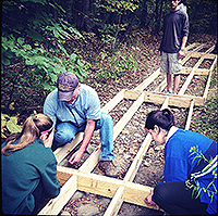 Building a boardwalk in the North Woods.