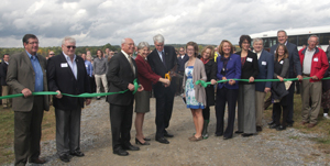 Dignitaries cut ribbon at solar celebration