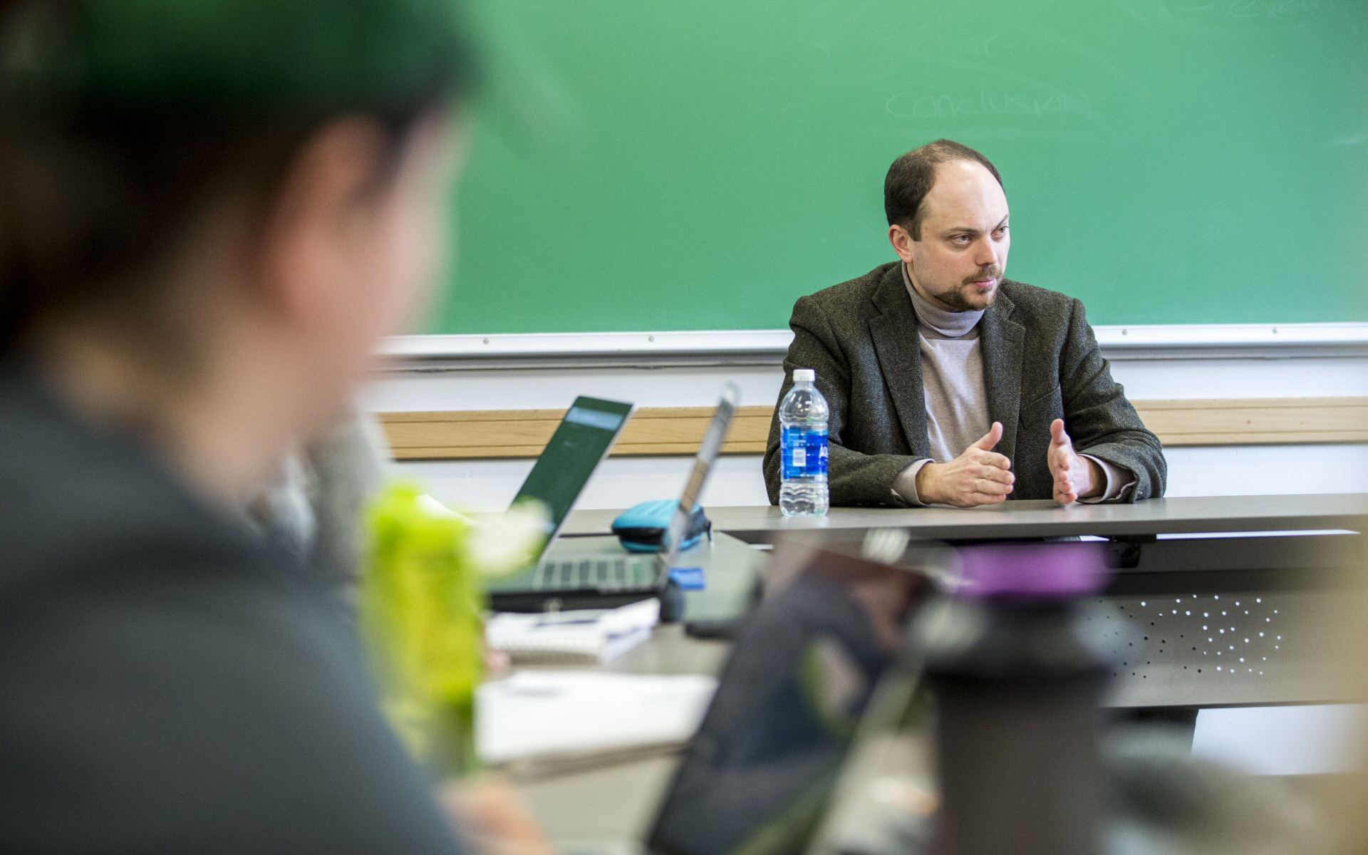 Russian documentarian-activitist talks to Skidmore students in a classroom