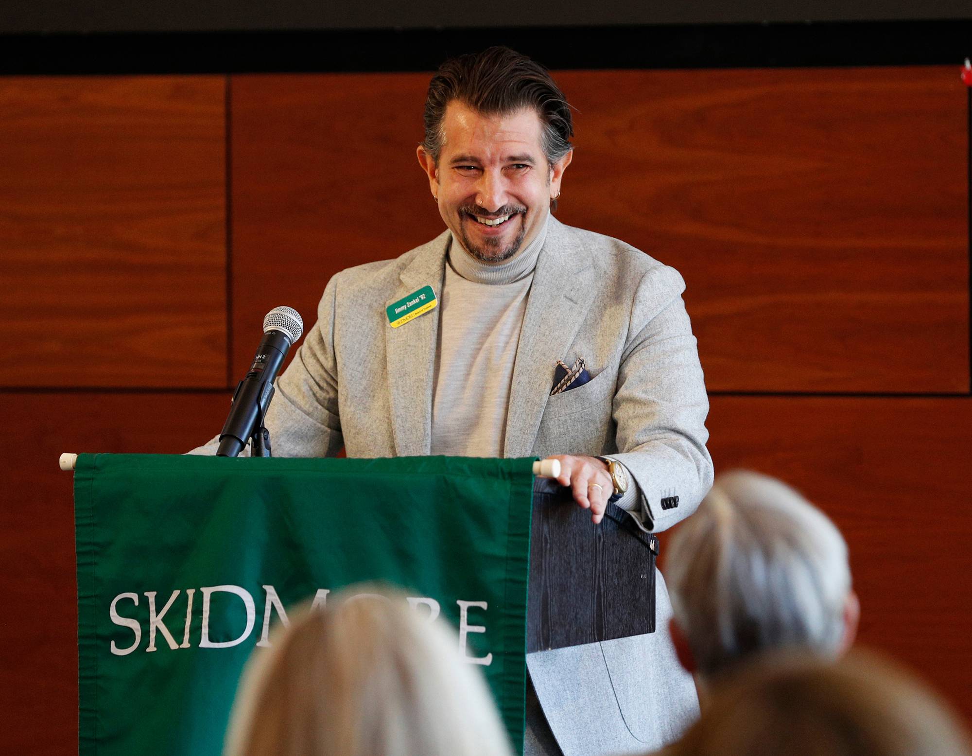 Jimmy Zankel '92 at Skidmore podium smiling