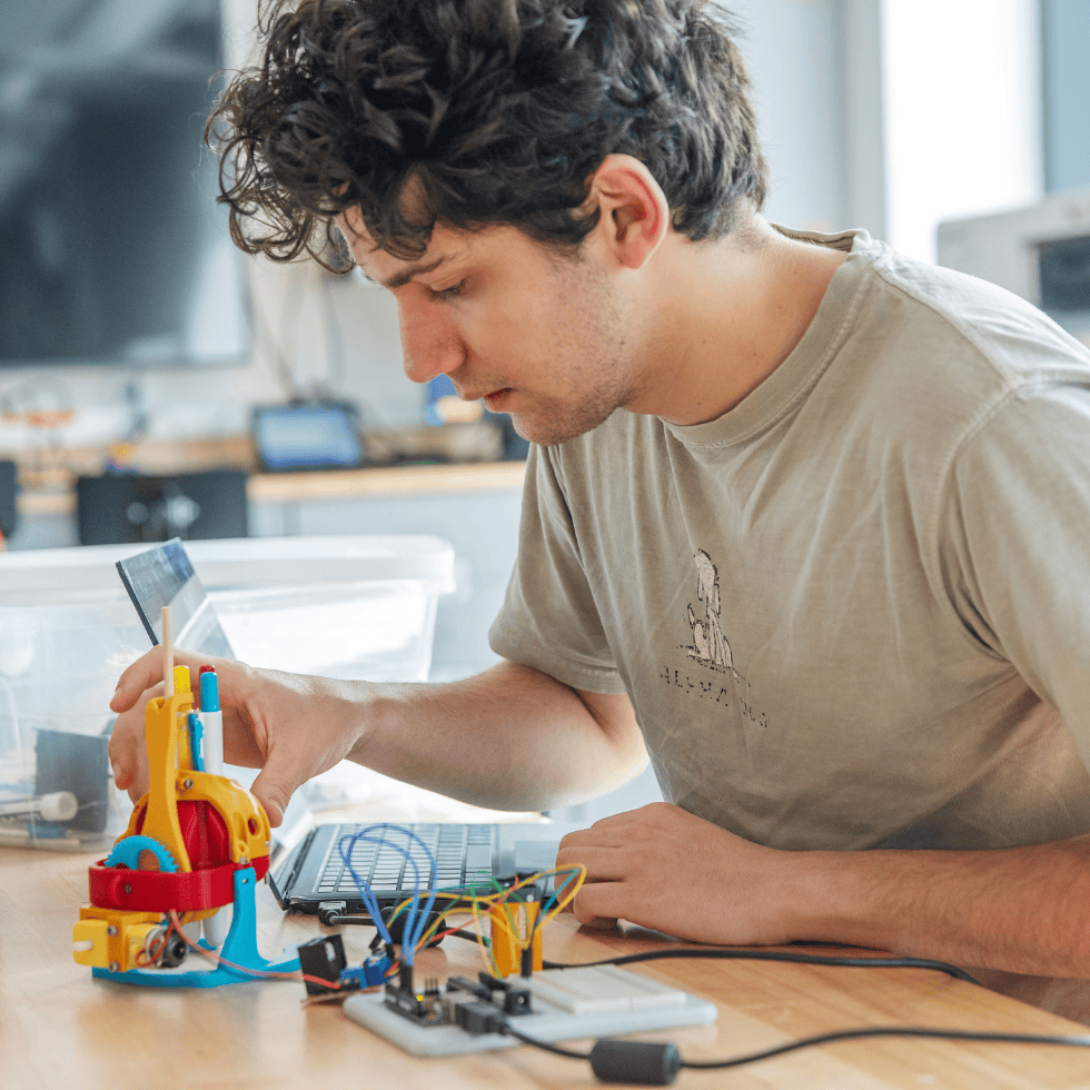 Skidmore College student Kian Mehran Lodge works in the IdeaLab