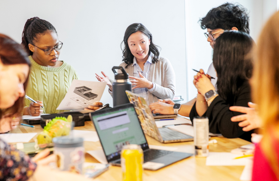 Assistant Professor of Classics Amy Oh teaches students in her course The Romans in Their Environment