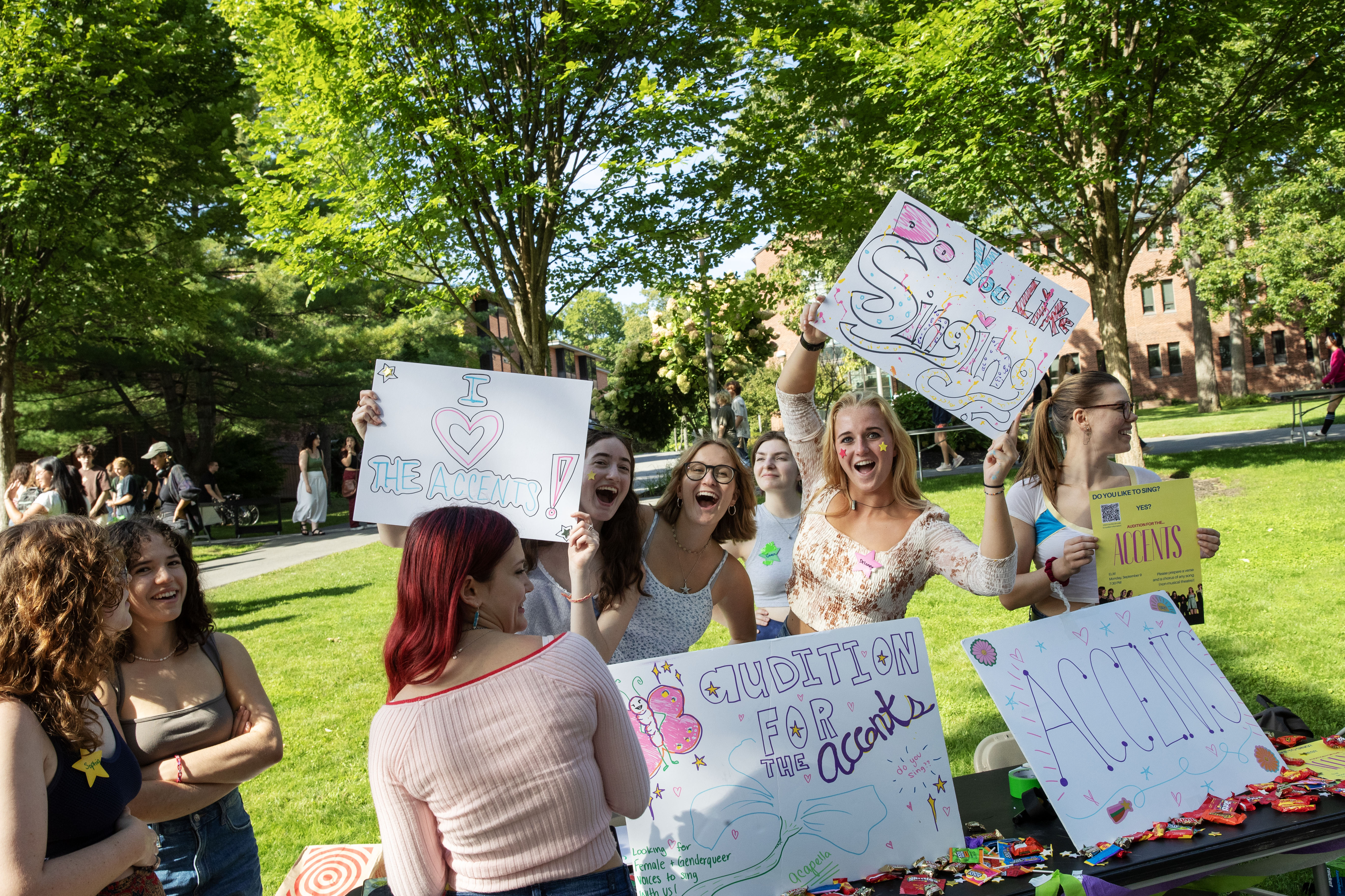 Students advertising a club for singing