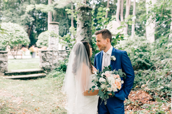 Bride and groom outside in the garden
