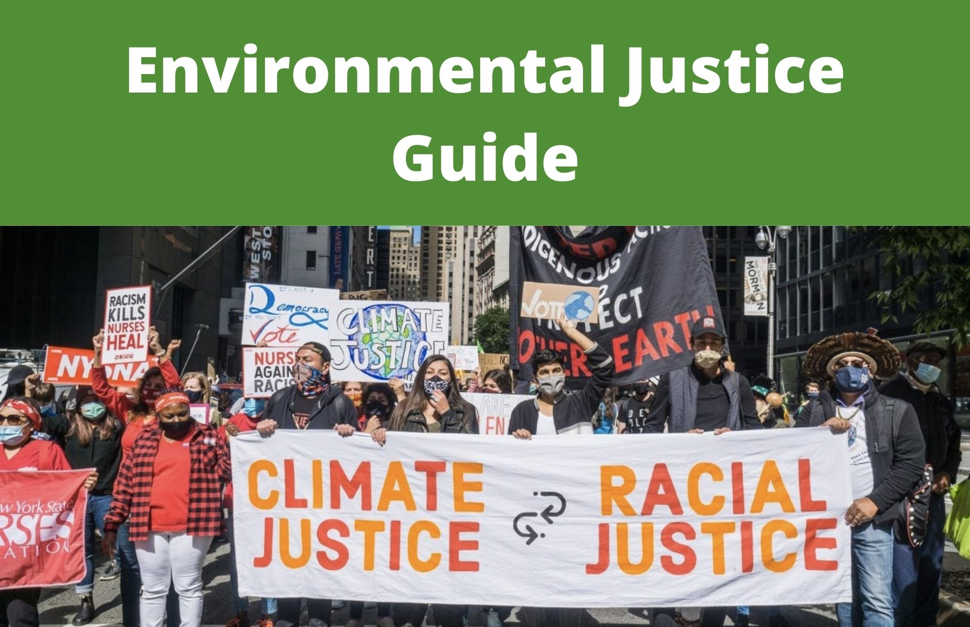 Picture of Extinction Rebellion in city with group of people holding banner 