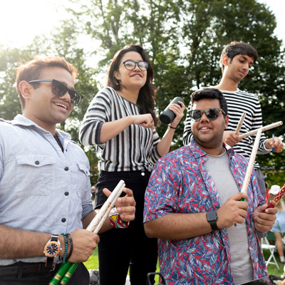 A group of students from Hayat Club gather during a fair 