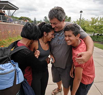 Student with their family on move in day