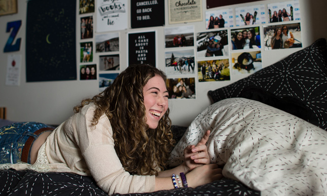 Skidmore college student in their dorm room