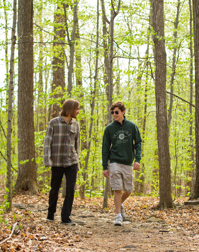 College students hike in Skidmore's North Woods