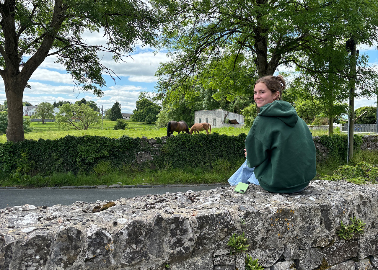 Gretchen Gwitt ’26 enjoying a quiet moment in in Dingle, Ireland, during the Travel Seminar, Exploring the West of Ireland: The Mystic Island.
