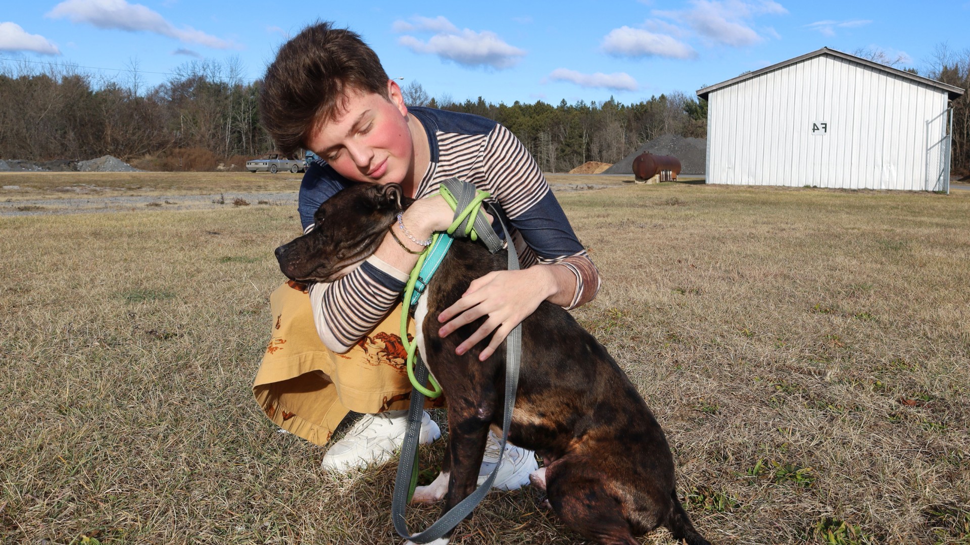 A photo of me, Emrah Jusufoski ’28, hugging Bronx during a volunteer shift at the Saratoga County Animal Shelter.