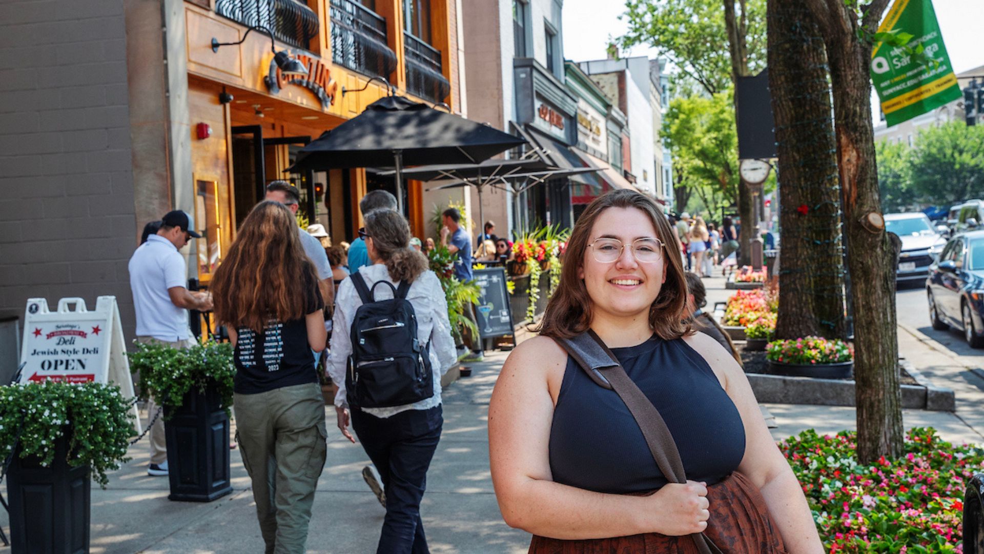 Paige Stephenson ’26 stands in front of the restaurant Cantina on Broadway in downtown Saratoga Springs, just a short walk from Skidmore’s campus — a hub of cozy cafes, independent bookstores, and student favorites.