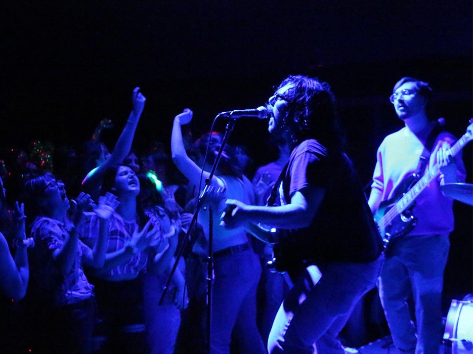 Students dance to the croon of a guest Indie Rock band.