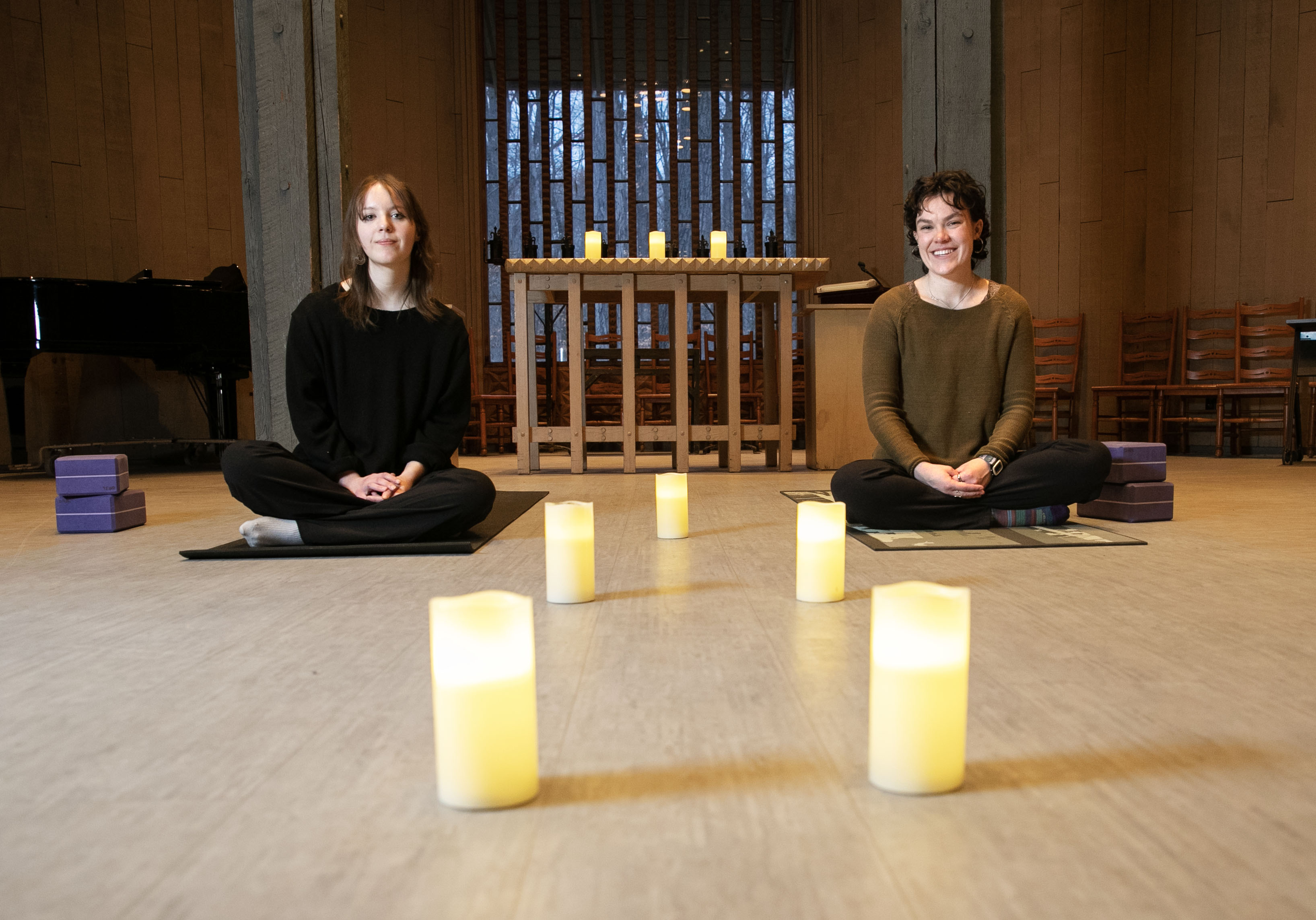 Grace and her friend doing yoga