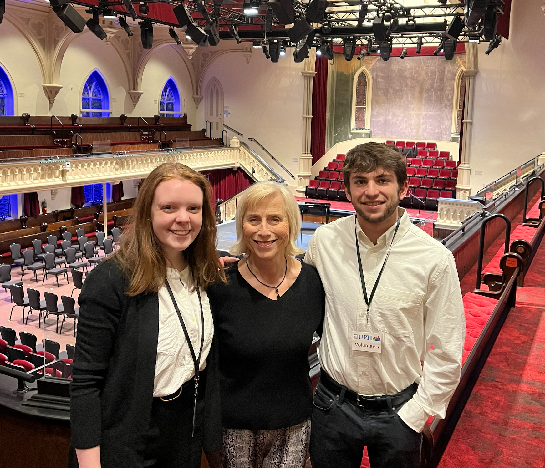 Teddy Foster ’95, center, with Skidmore arts administration students Gillian Garvey ’23, left, and Eli Cott ’25 in the balcony overlooking Universal Preservation Hall’s performance stage.