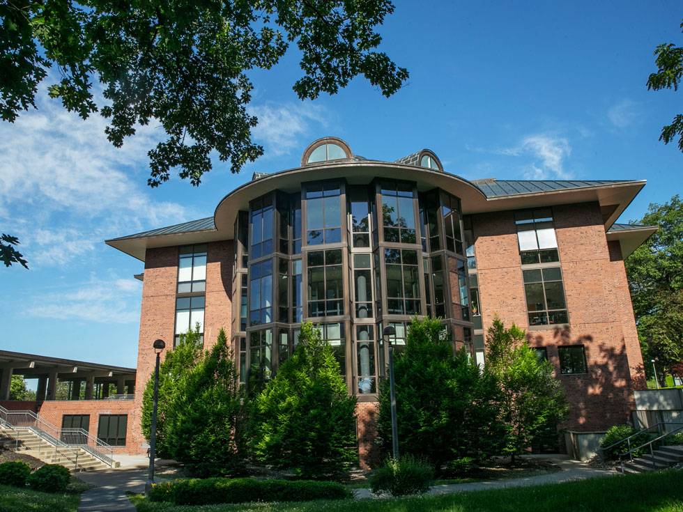 Exterior image of Lucy Scribner Library on a blue sky sunny day