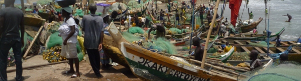 Ghana - People on a river bank