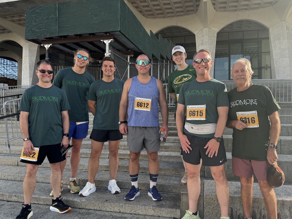 A group of seven Skidmore employees make up Skidmore's 2025 Workforce Challenge: They pose for a group photo 