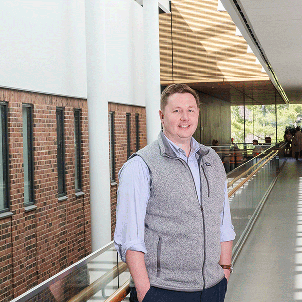 Matt Walsh ’13 poses on the second-level balcony of Skidmore's Billie Tisch Center for Integrated Sciences