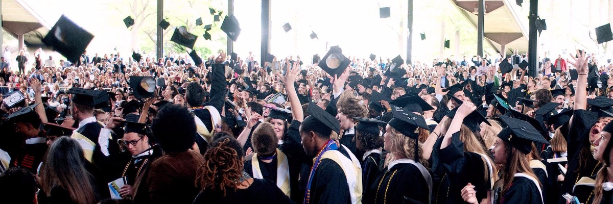 Class of 2016 throwing hats at the end of the ceremony 