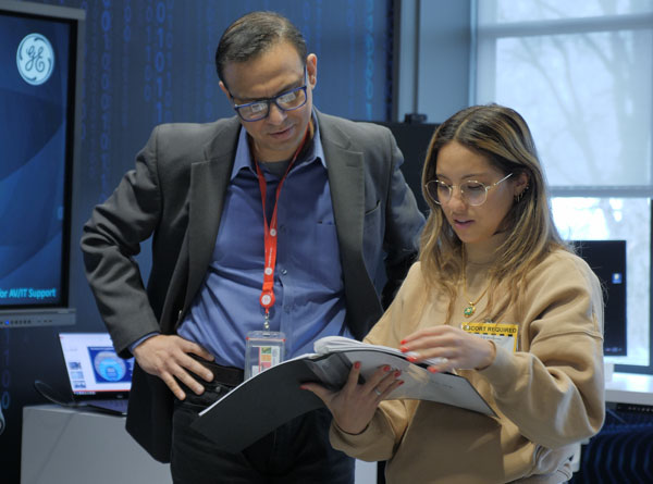 Students work with GE