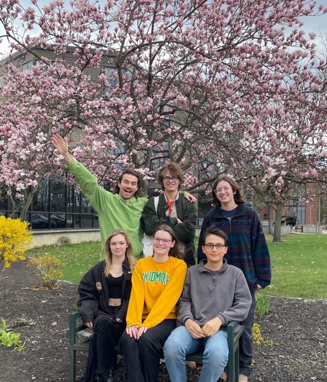 Skidmore Students standing under a tree
