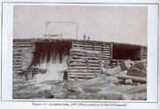 Historical photo of a log dam