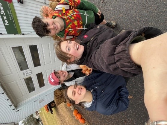 Students taking a selfie outside