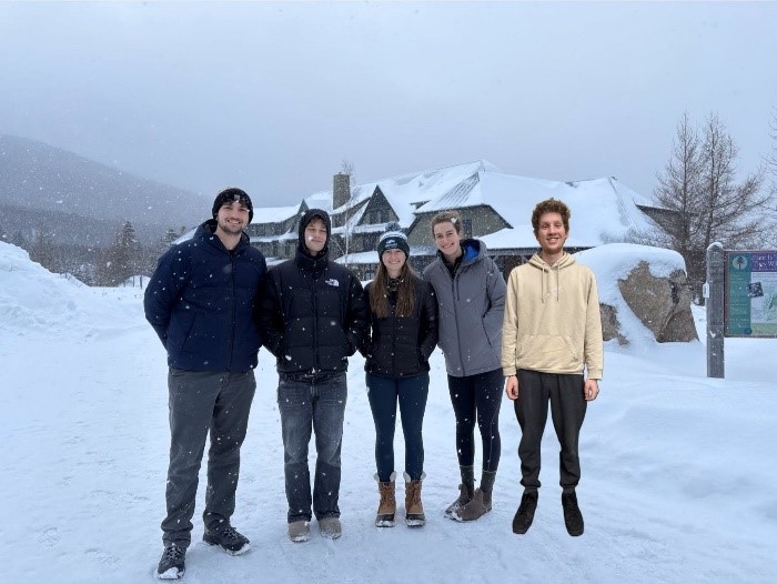 Students posing outside in the winter