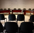 Empty chairs at a planning meeting