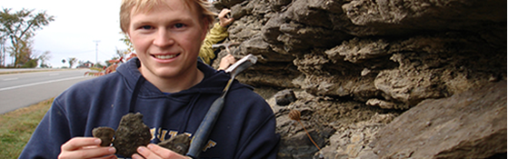 Student doing fieldwork in a lab